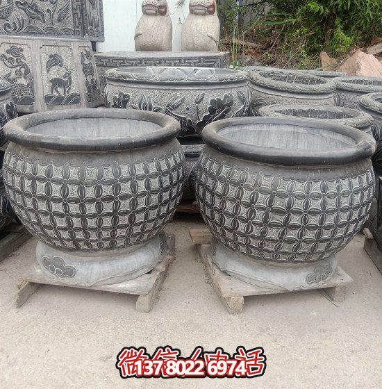 自然美學(xué)結(jié)合青石石雕、浮雕、編織、雕塑的戶外園林魚缸