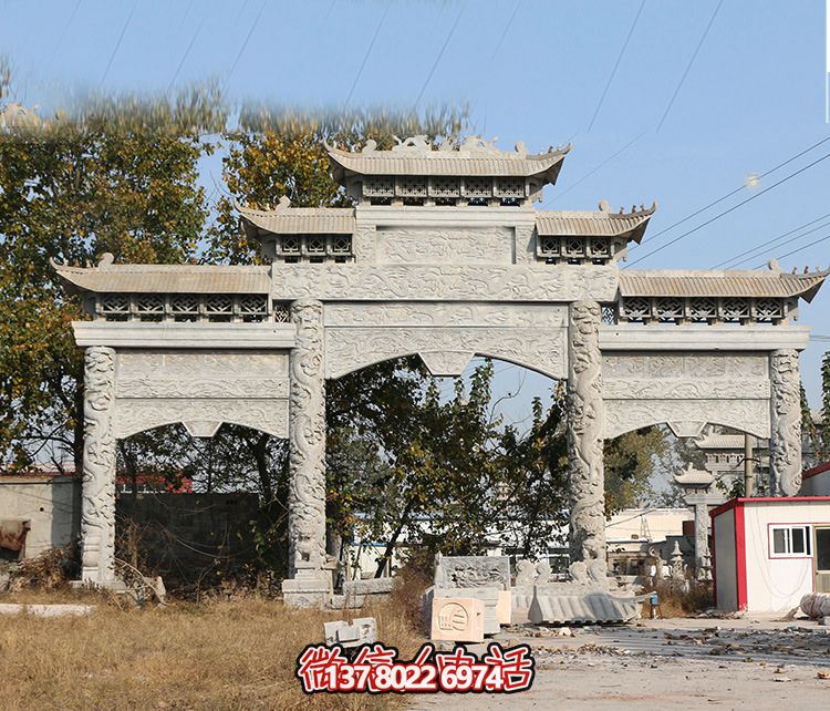 村鎮(zhèn)門(mén)口青石龍紋浮雕樓門(mén)牌坊雕塑